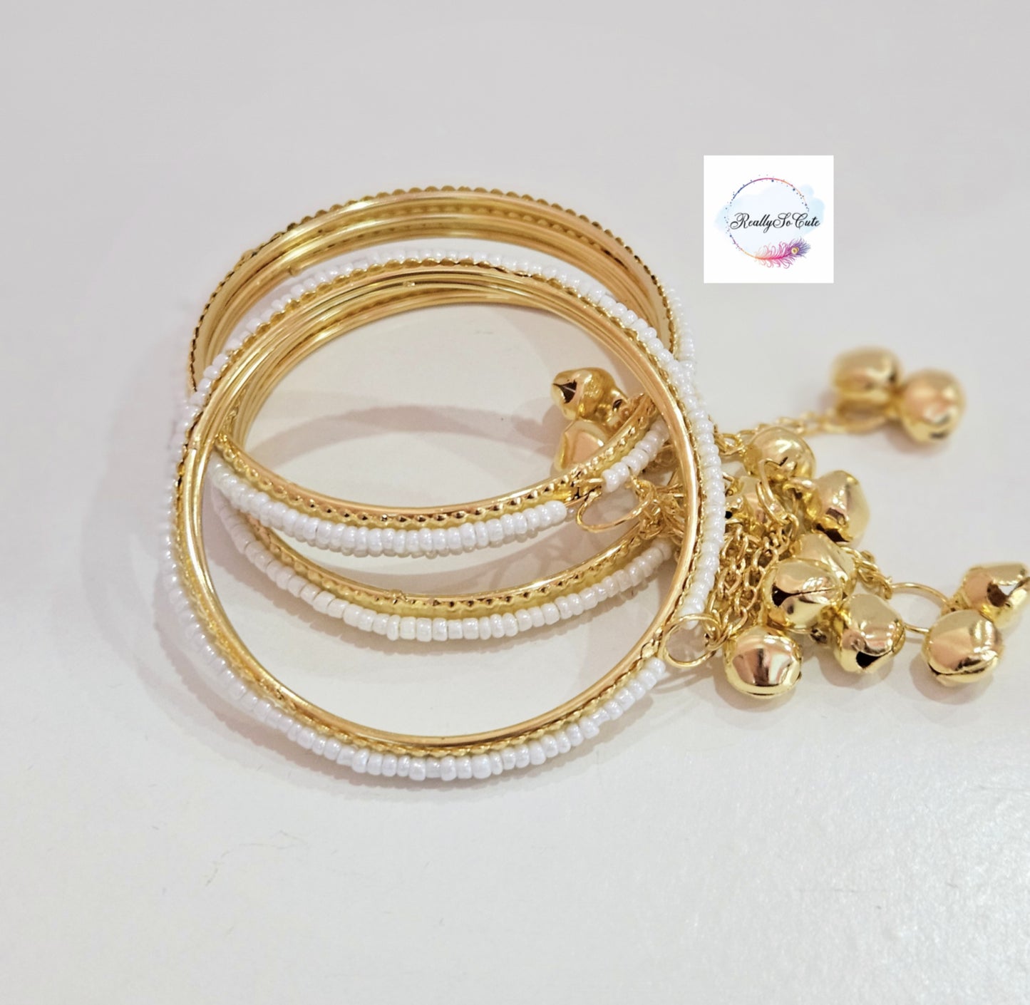 White color pearl bangles with dangles