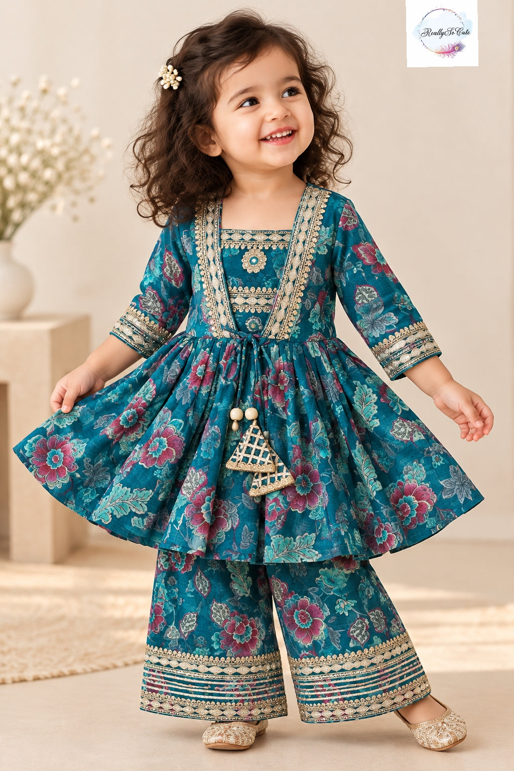 Teal Blue Floral Muslin 3-Piece Girls Ethnic Set | Long Kurti, Sharara & Palazzo Pants
Product Description: